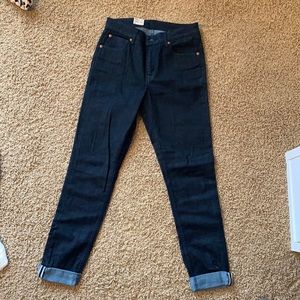 Never worn Levi’s commuter skinny jeans with reflective accents on ankles